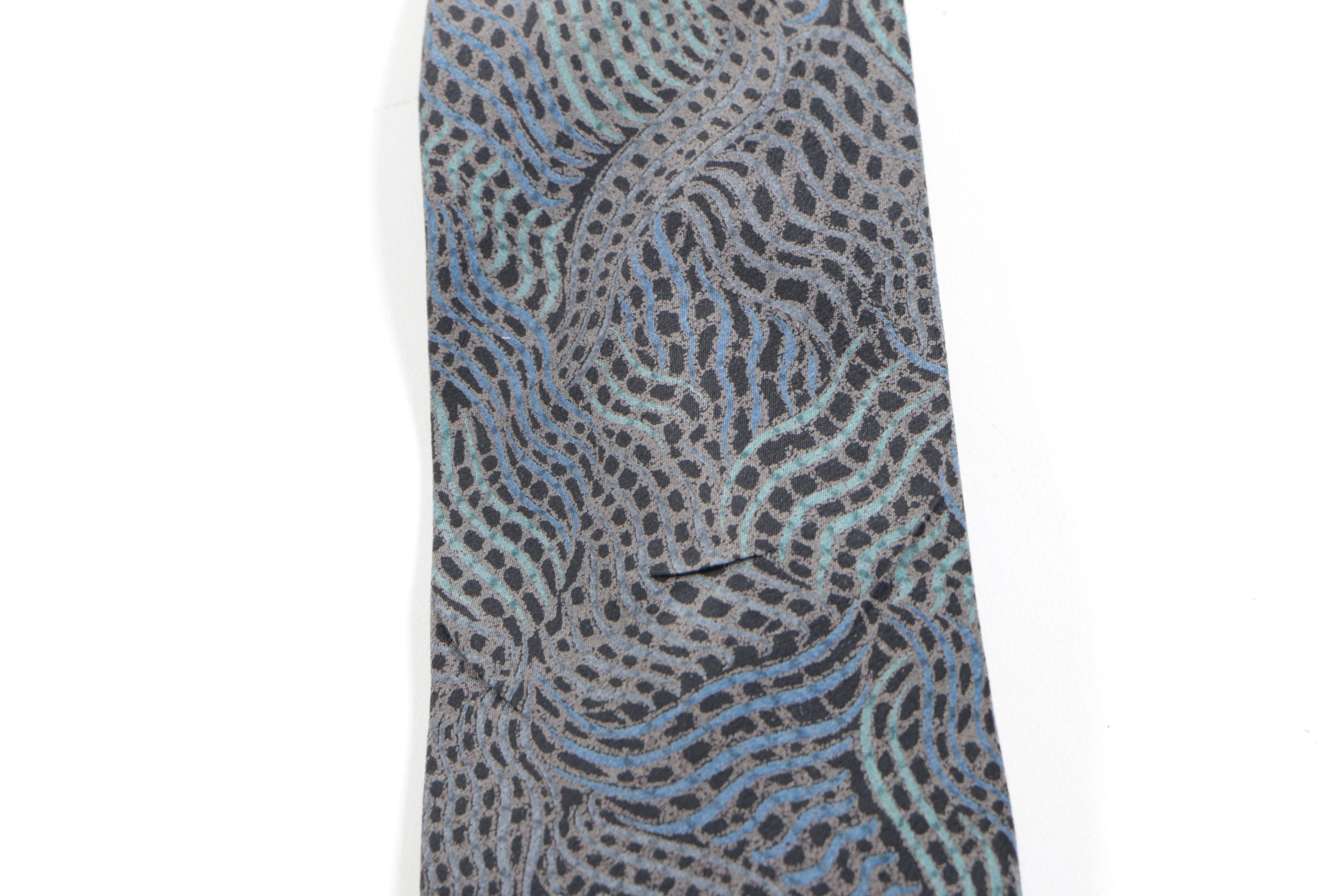 Neckties Including Valentino, Oscar de la Renta, and Beaufort
