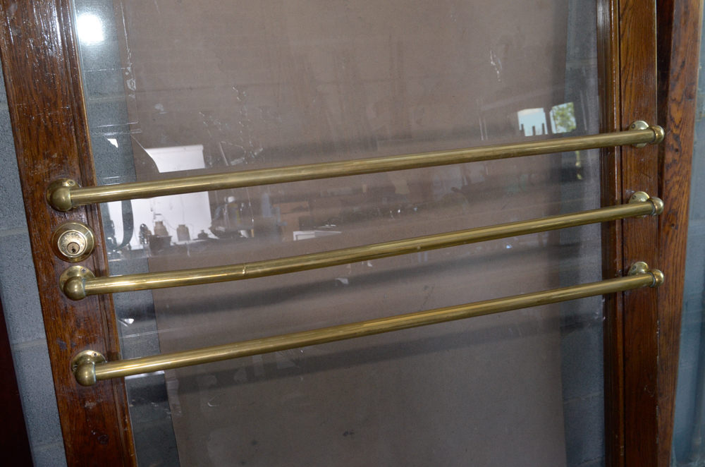Glass Paneled Door with Brass Hardware from Clyde's of Georgetow
