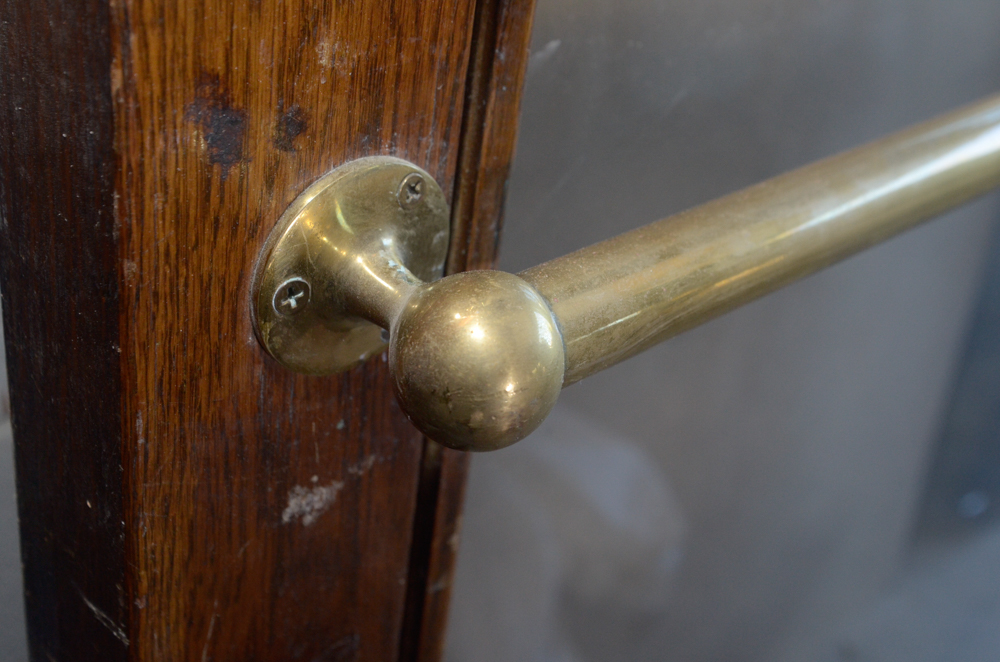 Glass Paneled Door with Brass Hardware from Clyde's of Georgetow