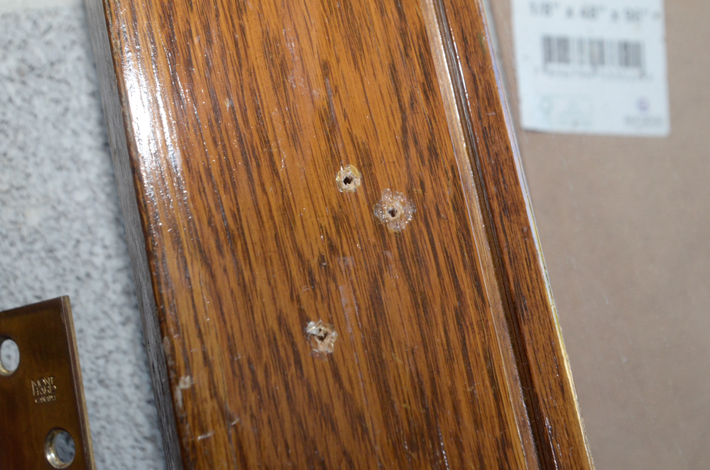 Glass Paneled Door with Brass Hardware from Clyde's of Georgetow