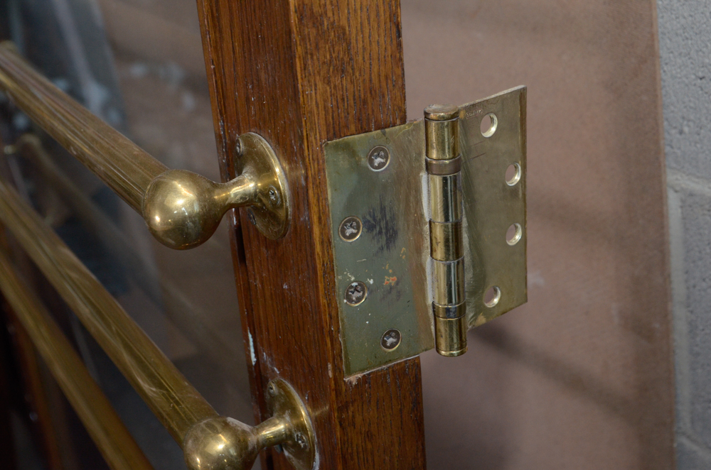 Glass Paneled Door with Brass Hardware from Clyde's of Georgetow