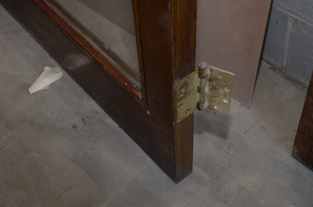 Glass Paneled Door with Brass Hardware from Clyde's of Georgetow