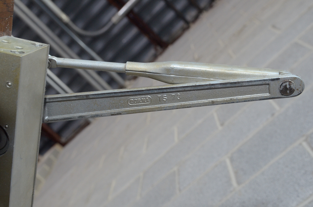 Glass Paneled Door with Brass Hardware from Clyde's of Georgetow