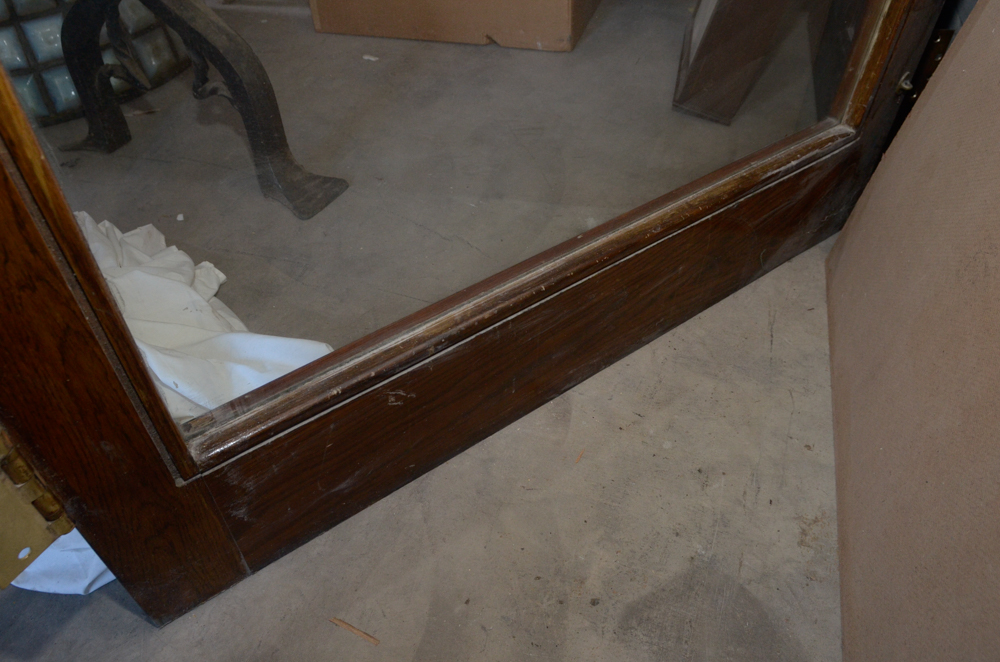 Glass Paneled Door with Brass Hardware from Clyde's of Georgetow