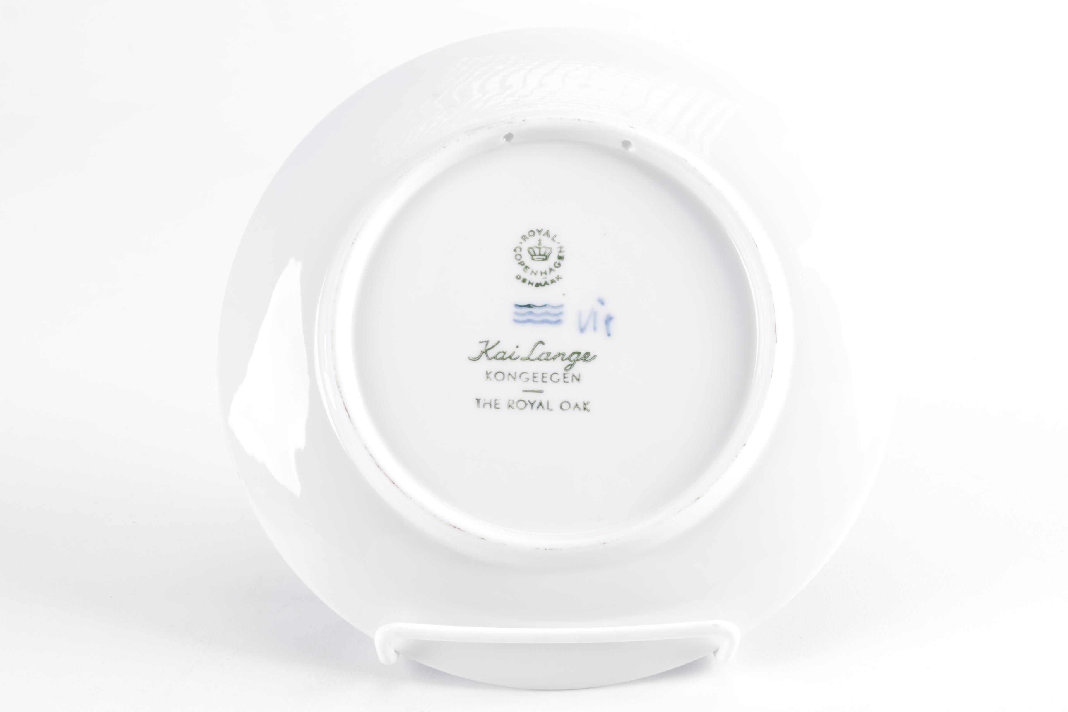 White and Blue Ceramic Decorative Plates From Royal Copenhagen