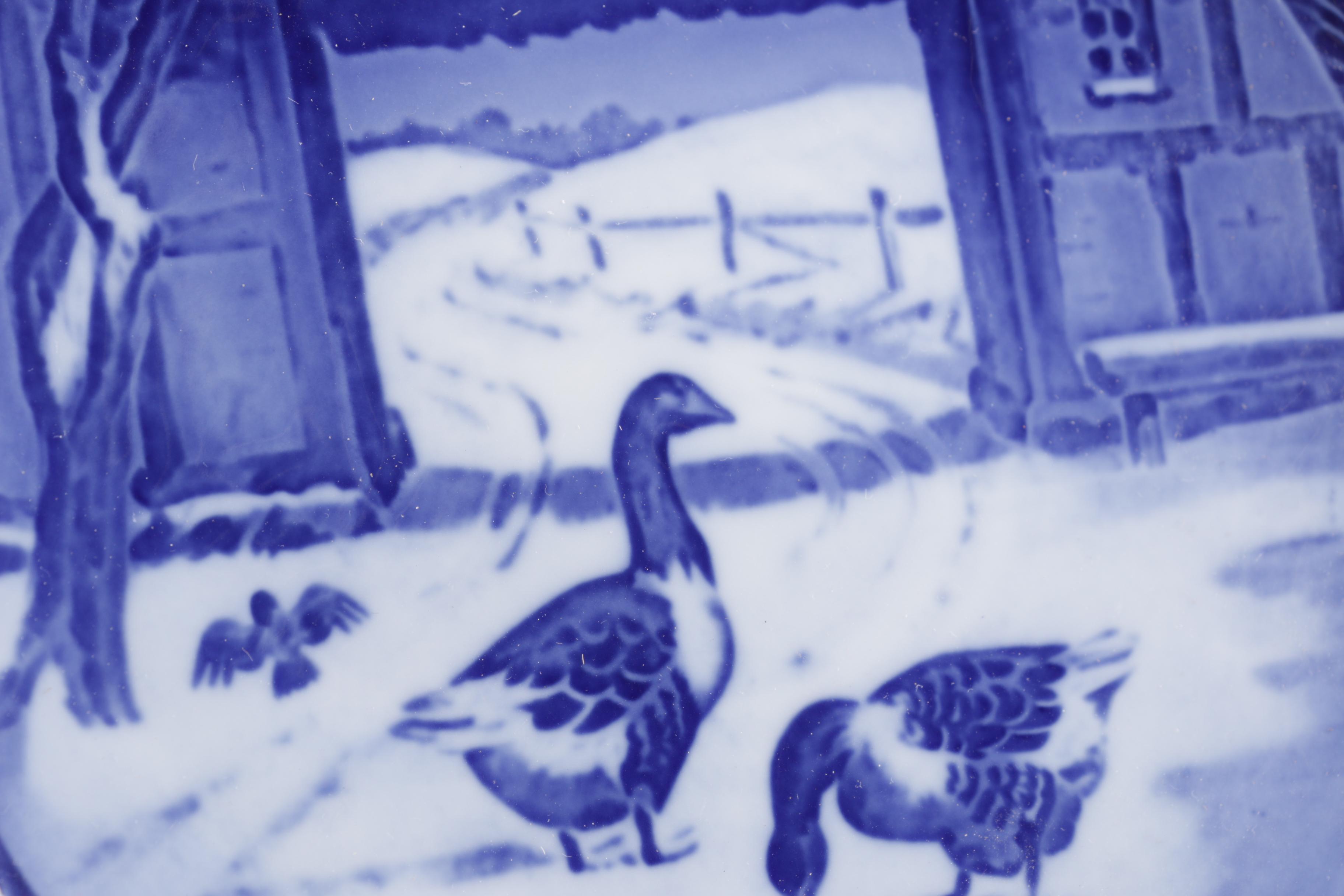 White and Blue Ceramic Decorative Plates From Royal Copenhagen