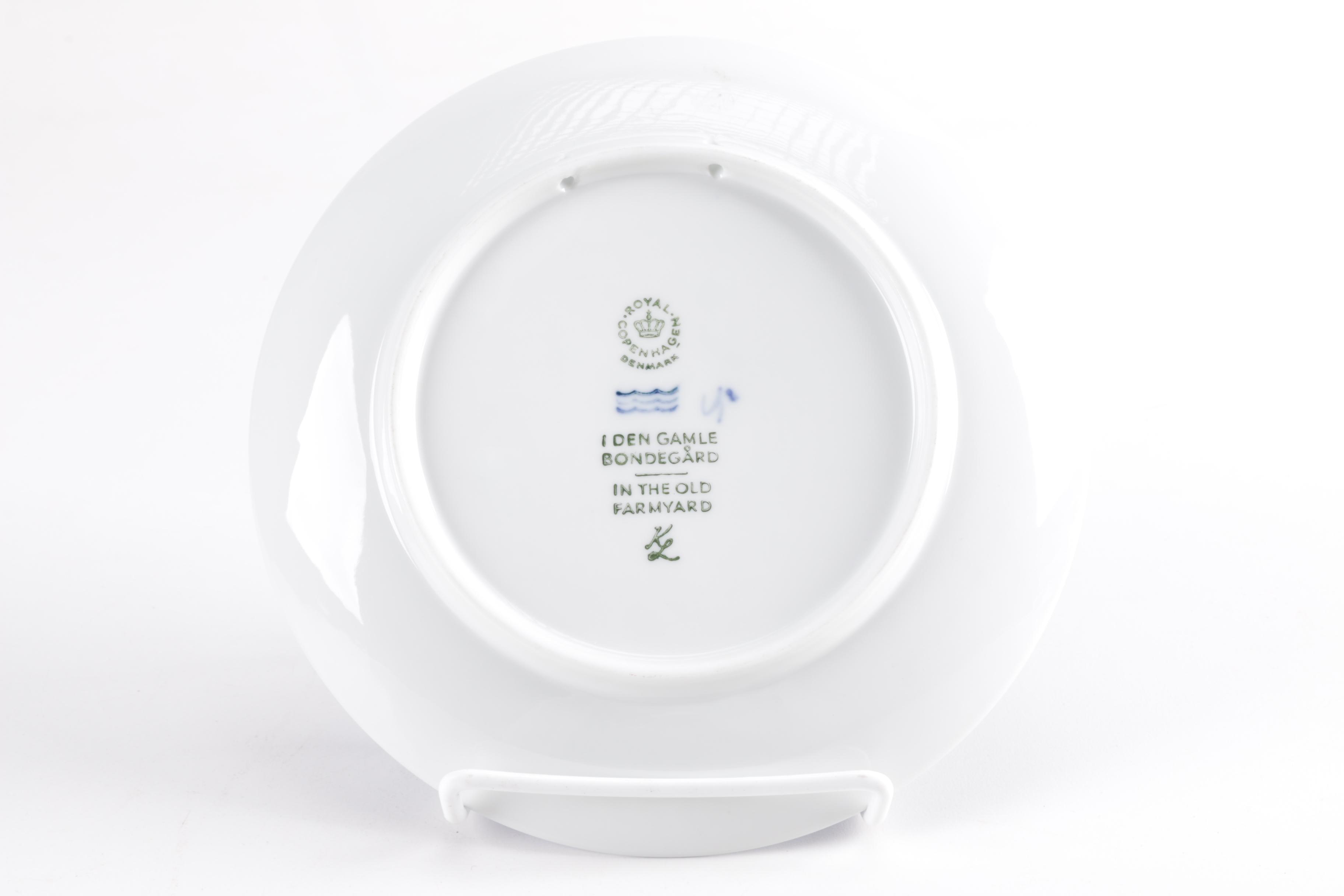 White and Blue Ceramic Decorative Plates From Royal Copenhagen