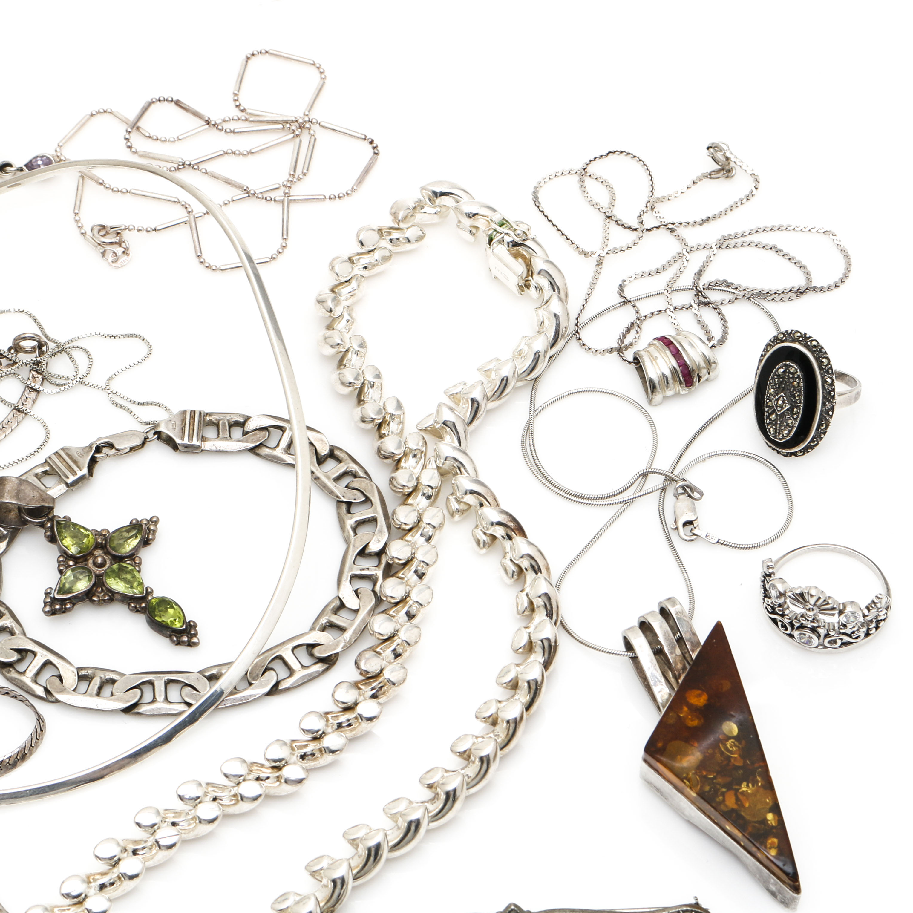 Assortment of Sterling Silver Jewelry Including Garnet, Amethyst, and Ruby