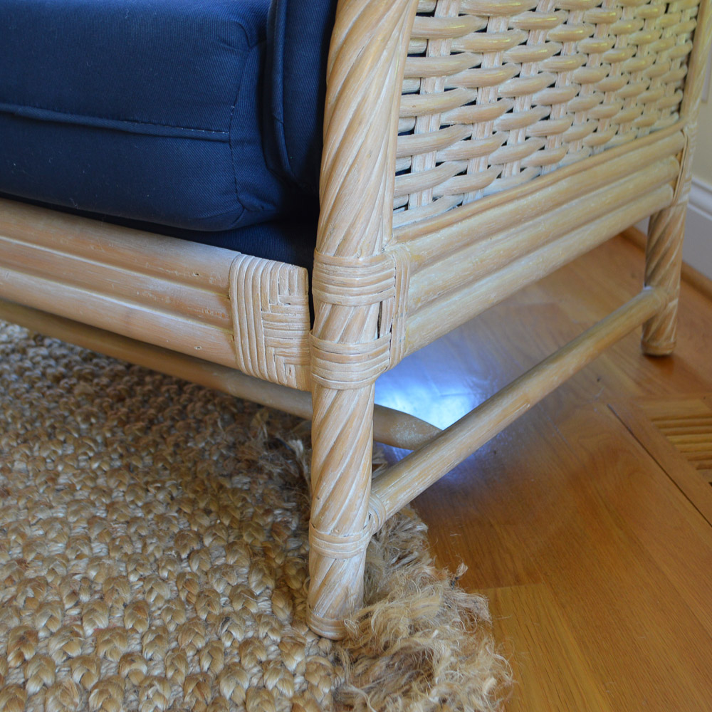 Faux Bamboo and Wicker Wing Chair With Ottoman