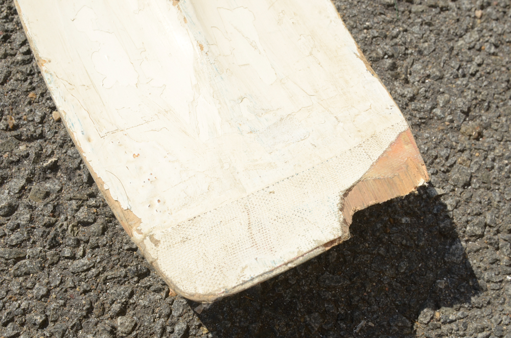 Collection of Vintage Rowing Oars with White Blades