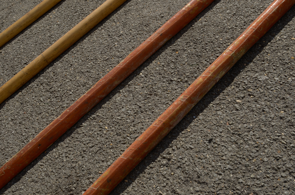 Collection of Vintage Rowing Oars with White Blades