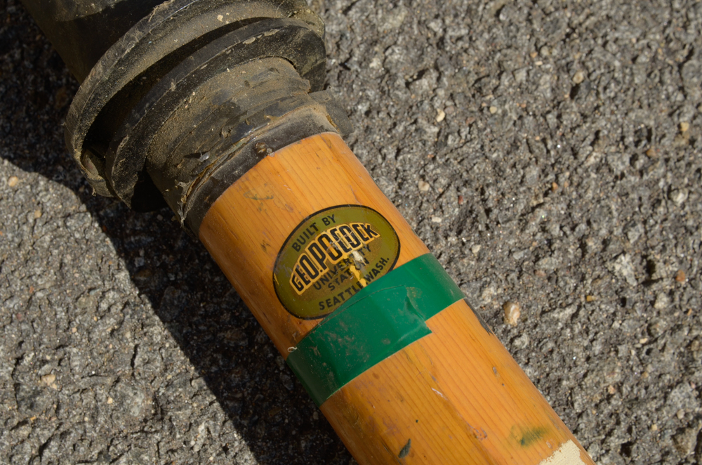 Collection of Vintage Rowing Oars with White Blades