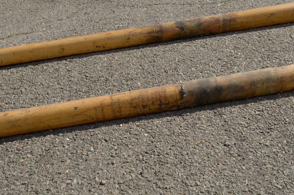 Collection of Vintage Rowing Oars with White Blades