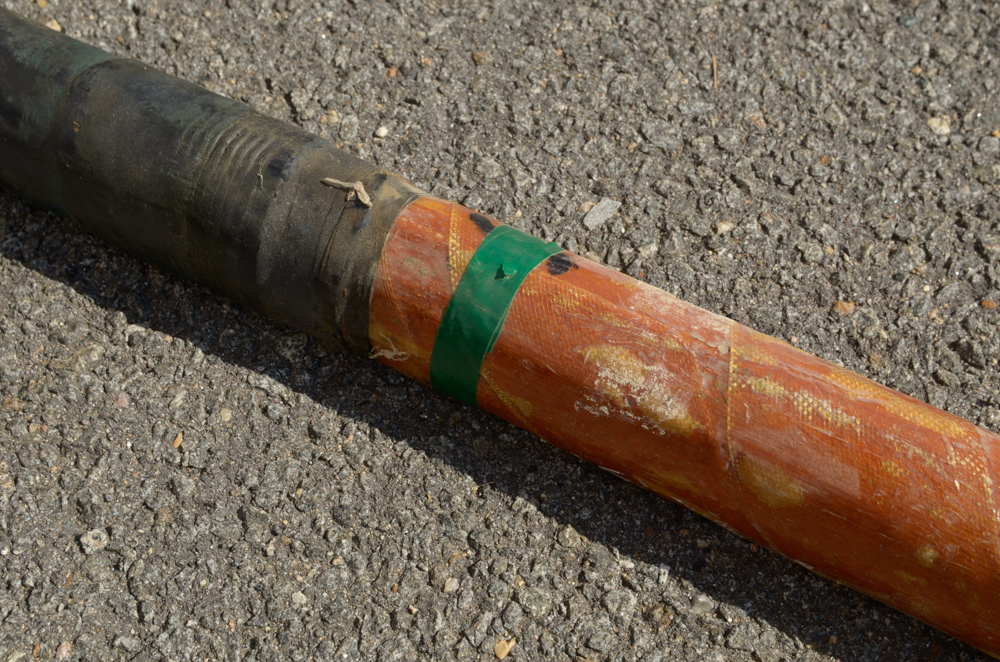 Collection of Vintage Rowing Oars with White Blades