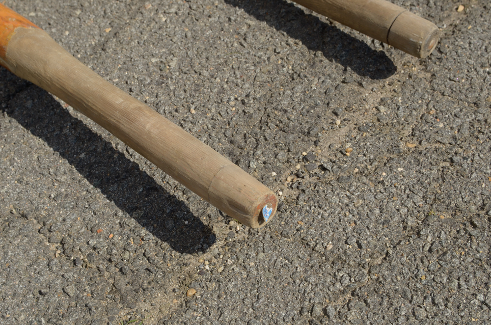 Collection of Vintage Rowing Oars with White Blades