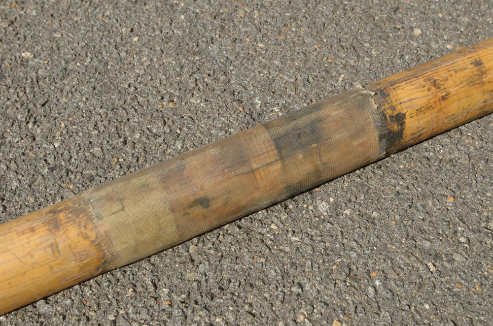 Collection of Vintage Rowing Oars with White Blades