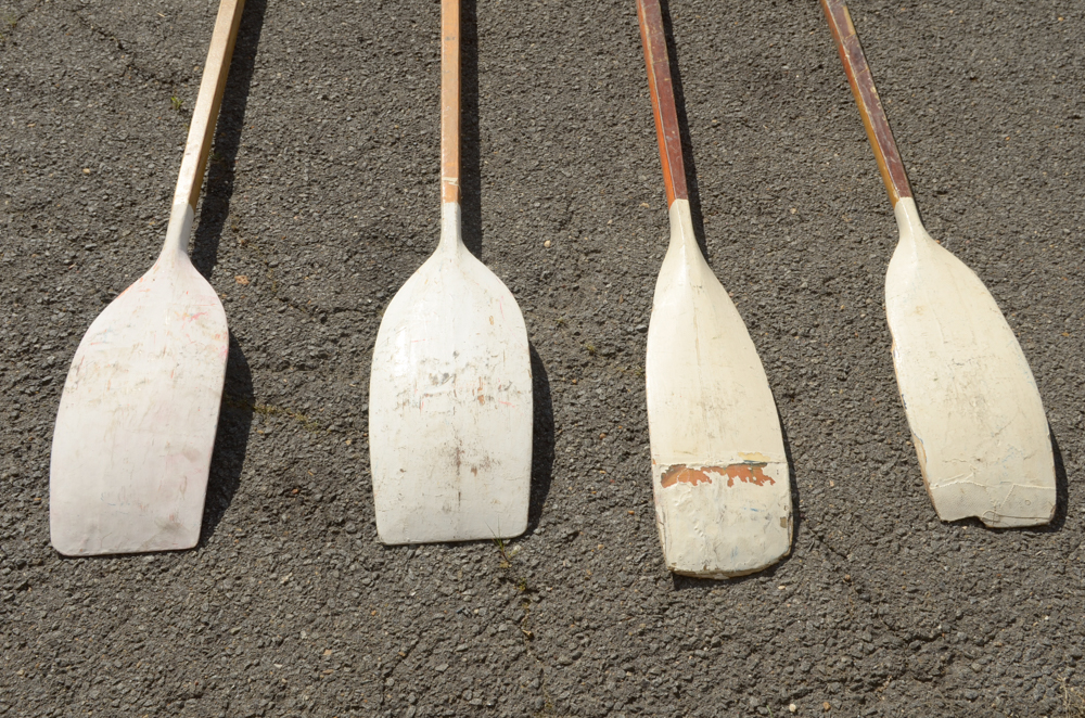 Collection of Vintage Rowing Oars with White Blades