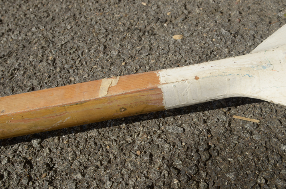 Collection of Vintage Rowing Oars with White Blades