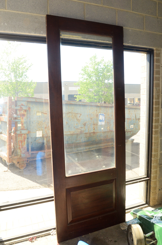 Wooden Paneled Door with Glass Insert