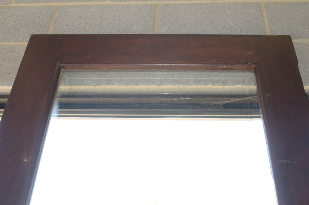 Wooden Paneled Door with Glass Insert