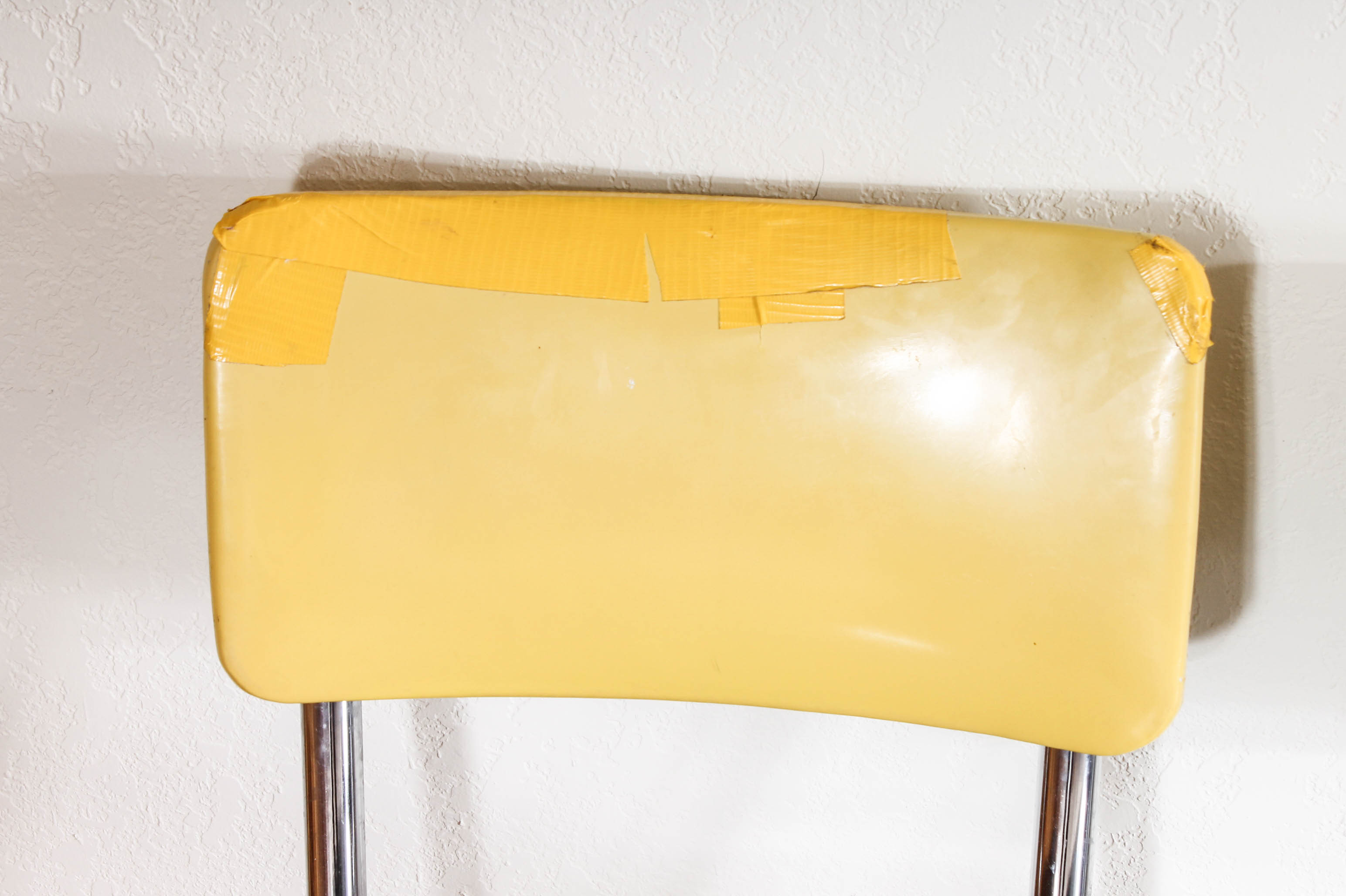 Retro Yellow and Black Dining Table with Vinyl Chairs by Kuehne