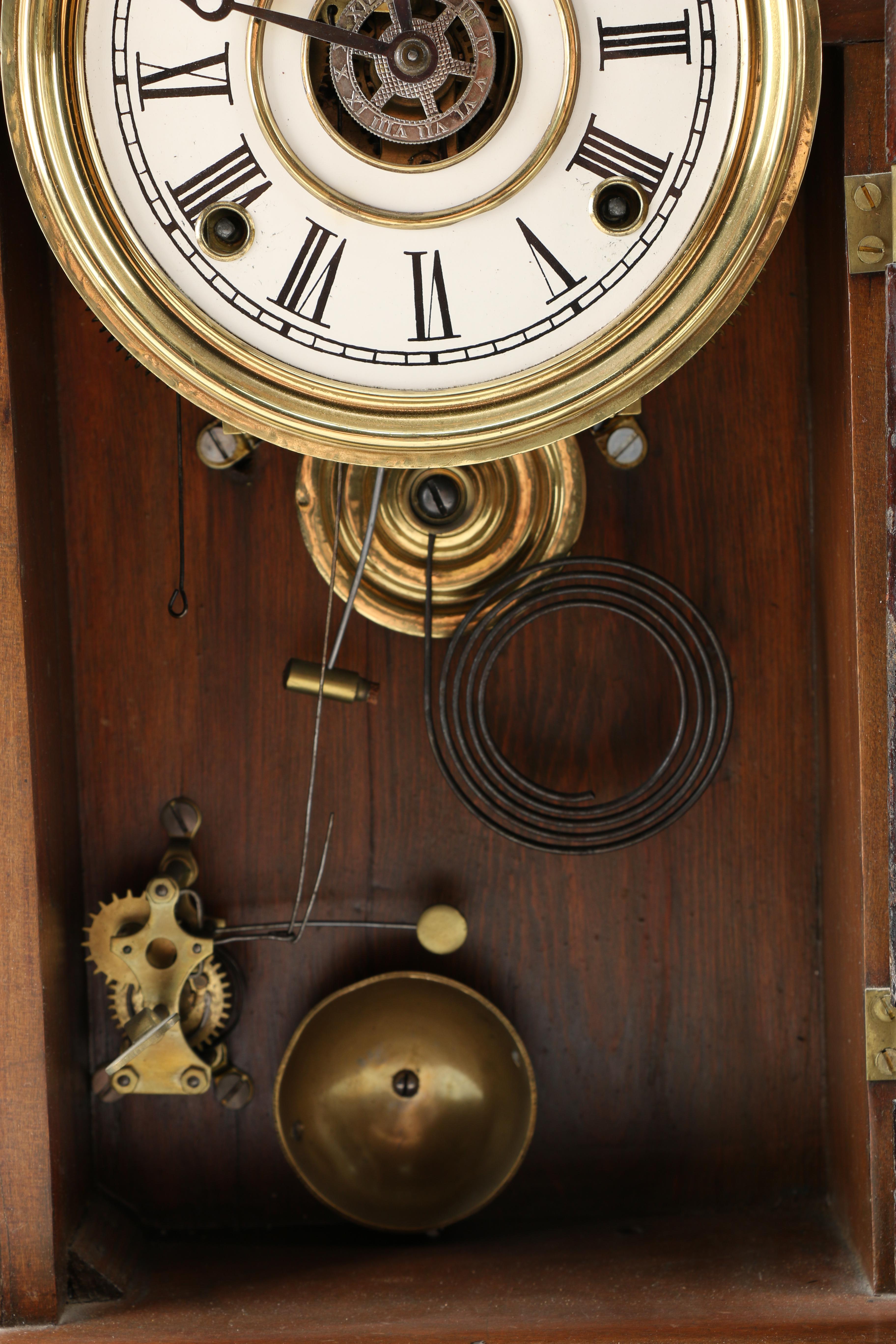 Wood and Brass Pendulum Clock