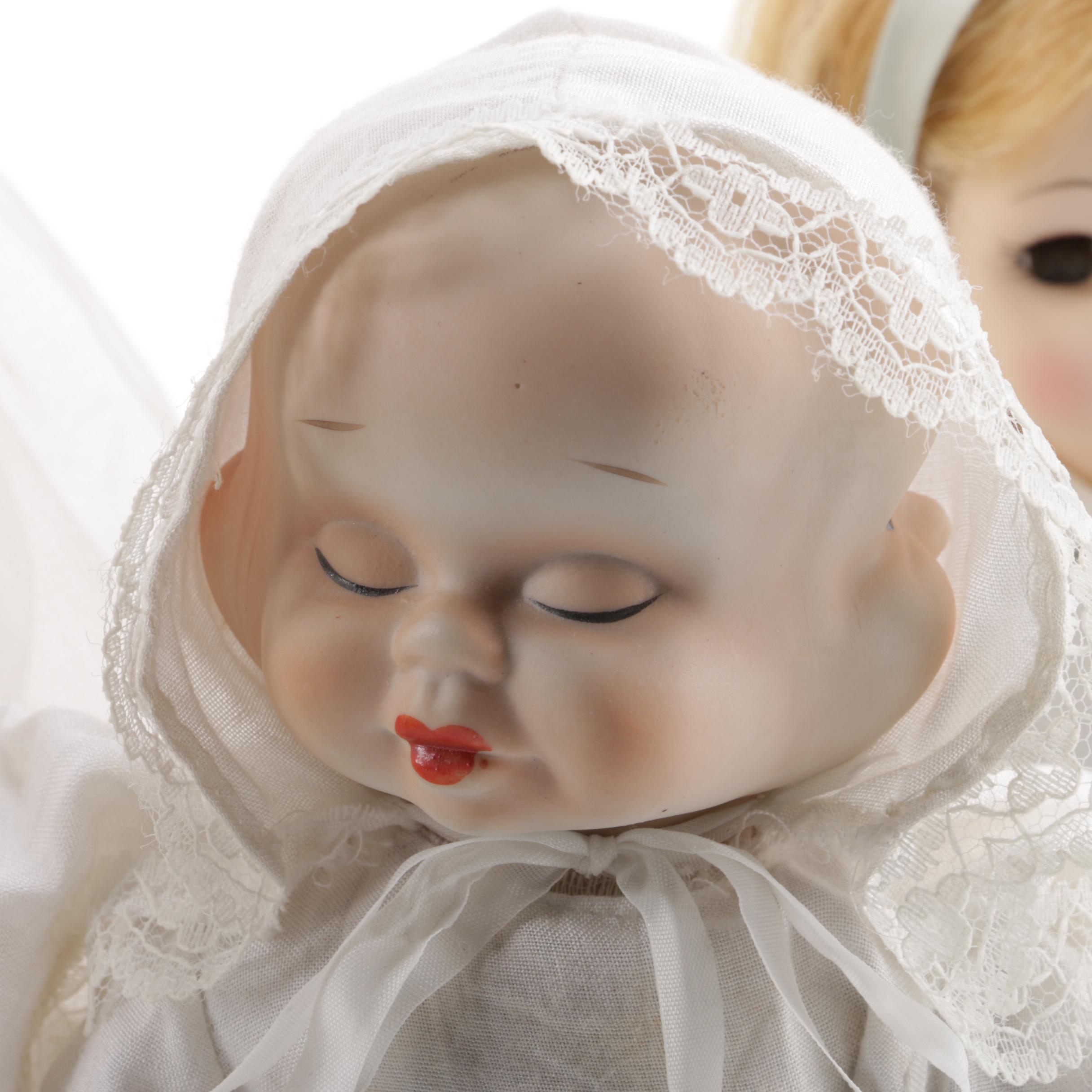 Doll Collection Including Madame Alexander, a Pierrot, and a Three-Faced Baby Doll