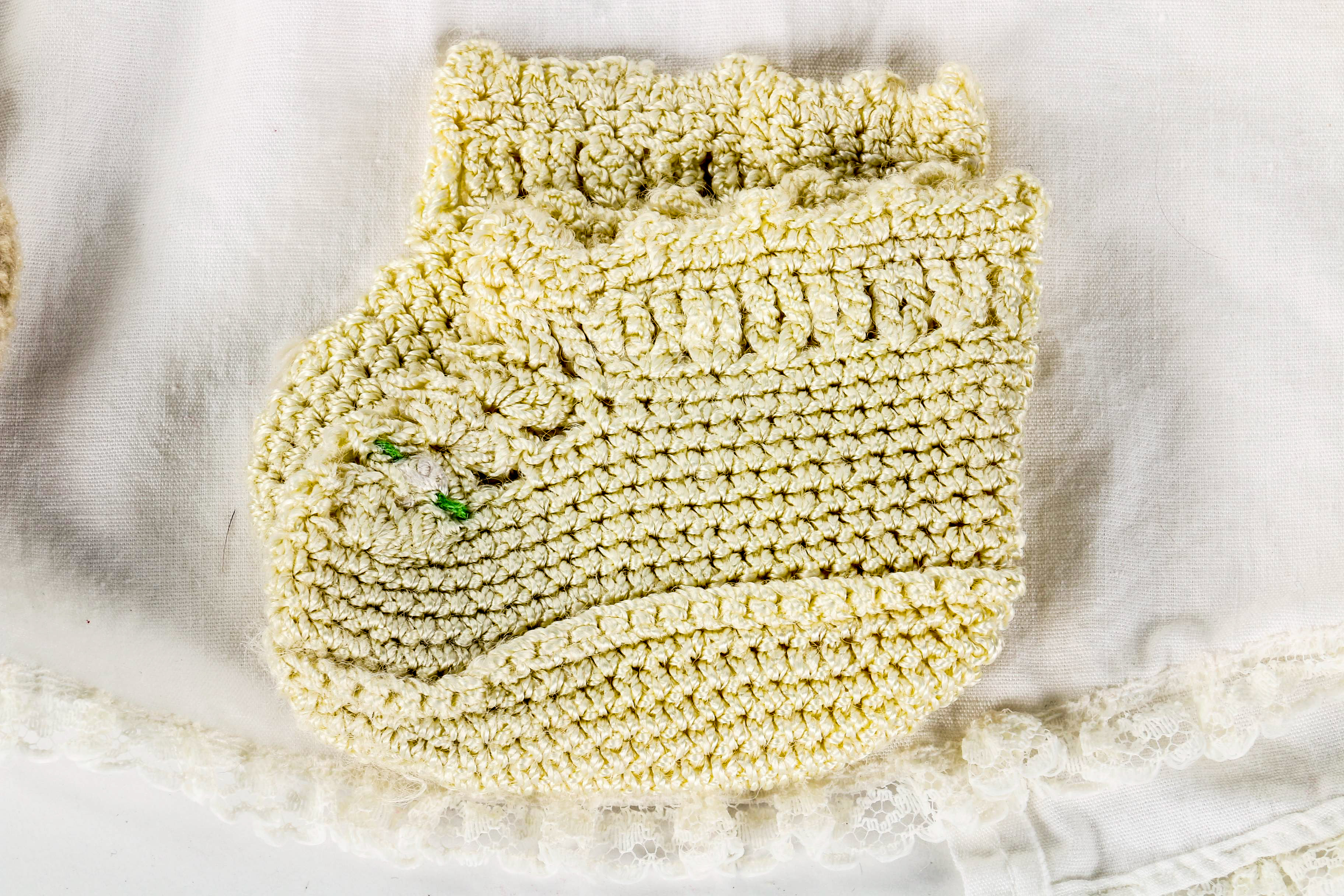 Assortment of Baby Clothes and Booties