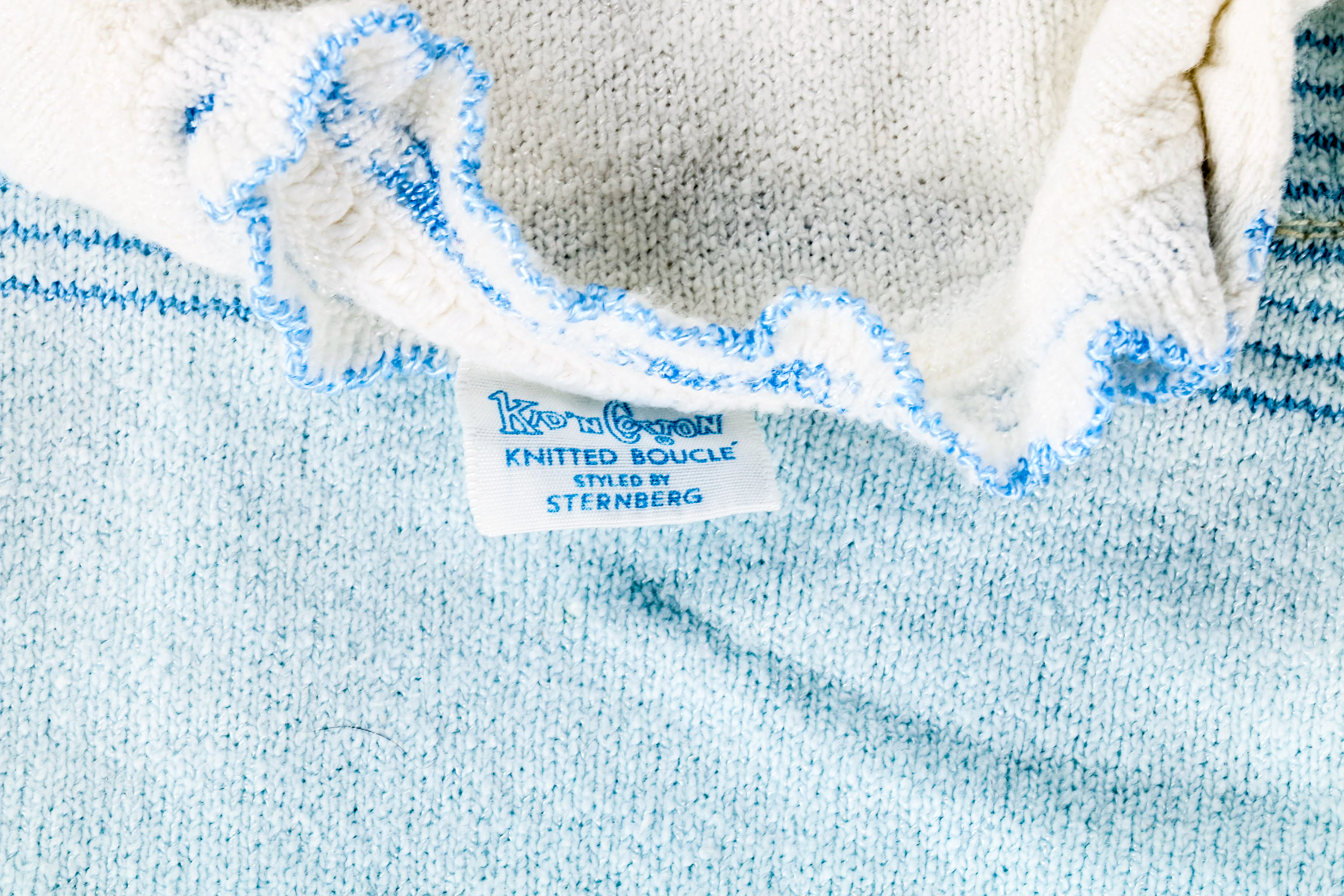 Assortment of Baby Clothes and Booties
