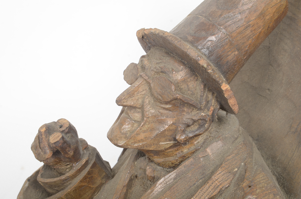 Wooden Bracket with Carving of Elderly Man