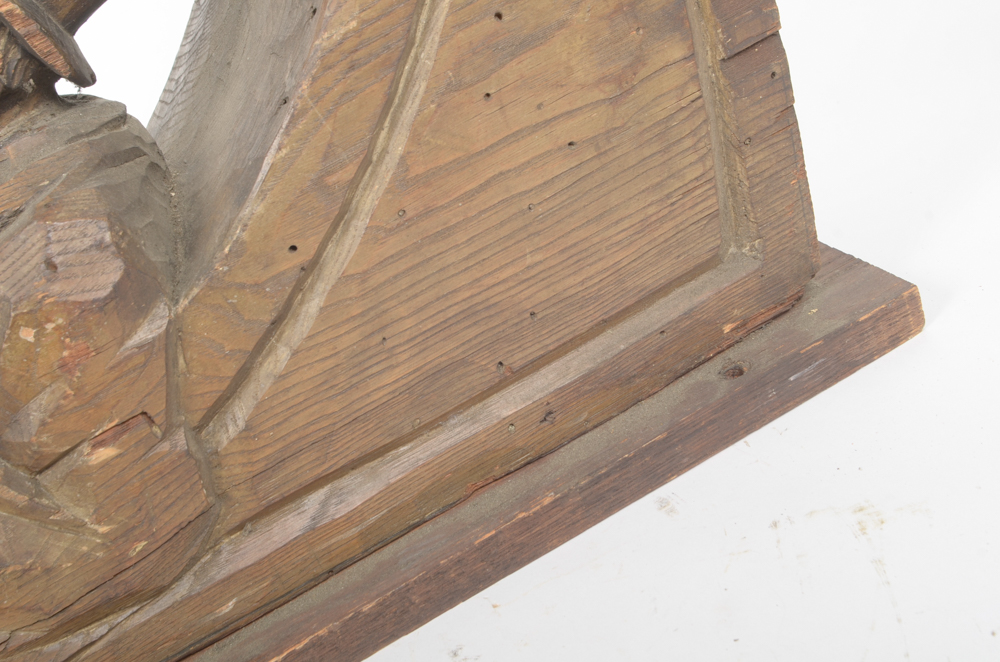 Wooden Bracket with Carving of Elderly Man