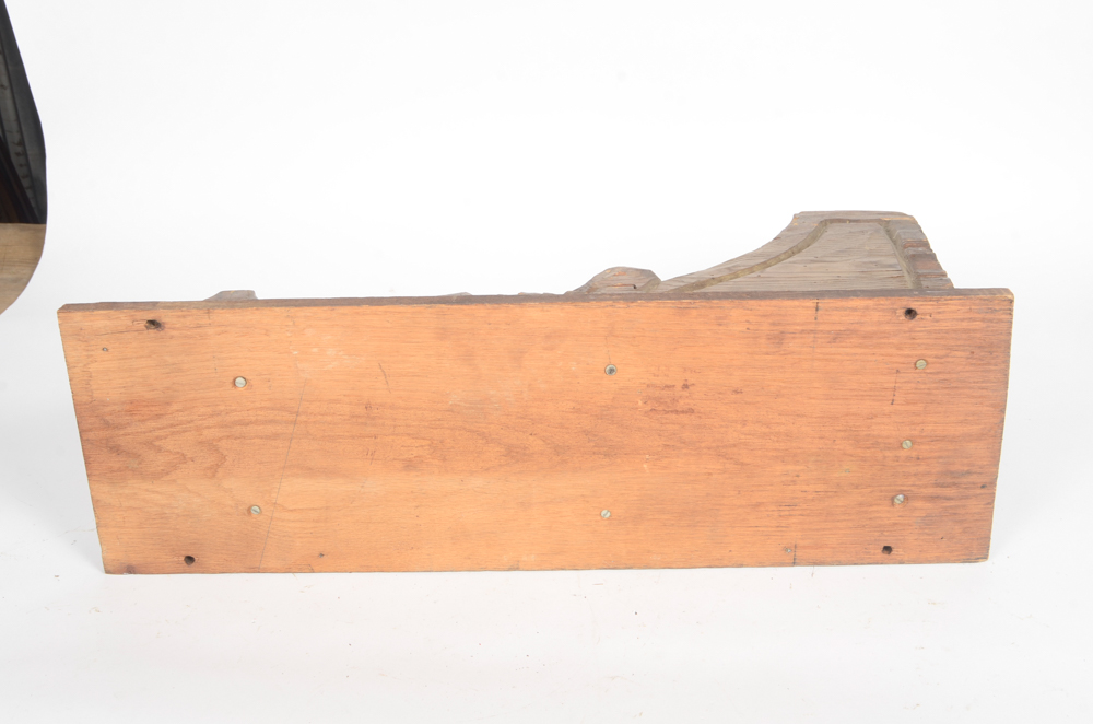 Wooden Bracket with Carving of Elderly Man