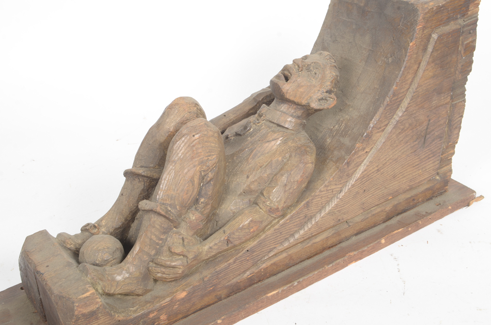 Hand Carved Wooden Bracket with Imprisoned Man