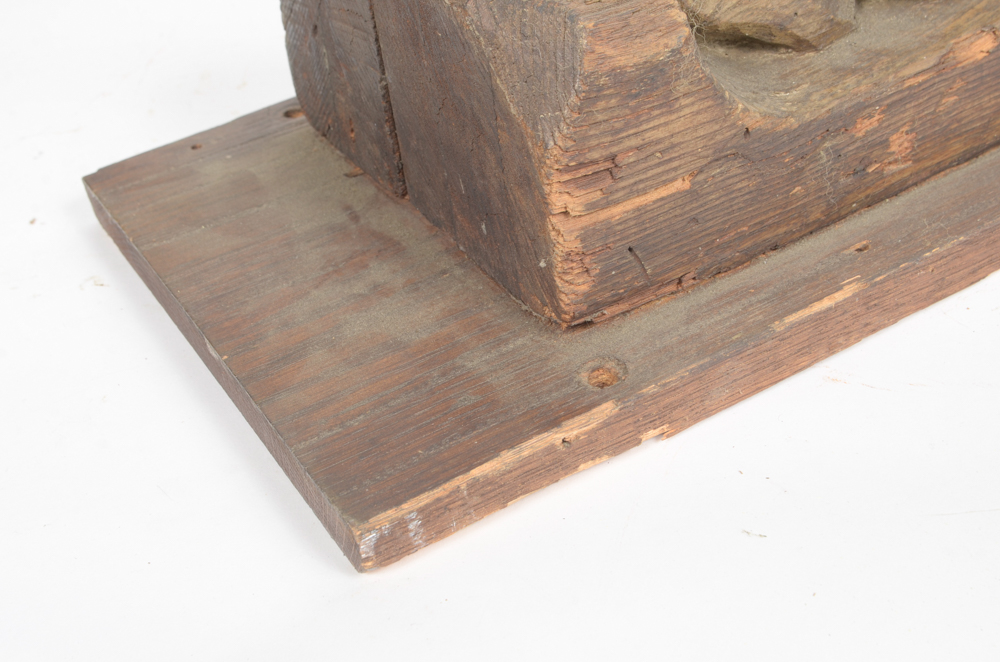 Hand Carved Wooden Bracket with Imprisoned Man