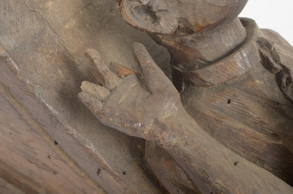 Hand Carved Wooden Bracket with Imprisoned Man
