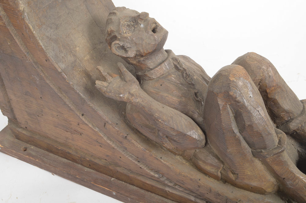 Hand Carved Wooden Bracket with Imprisoned Man