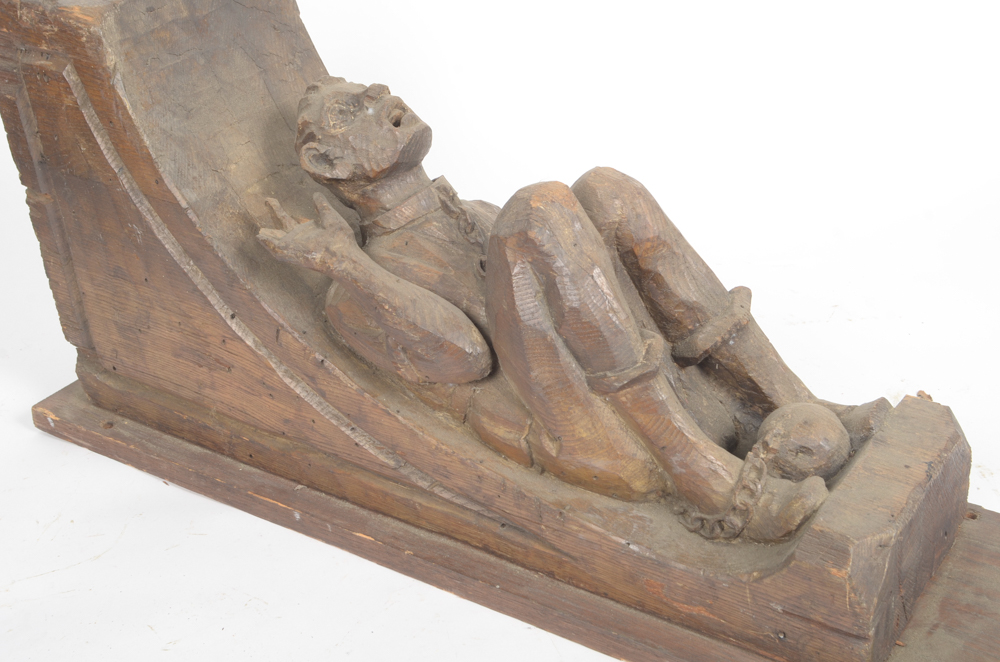 Hand Carved Wooden Bracket with Imprisoned Man
