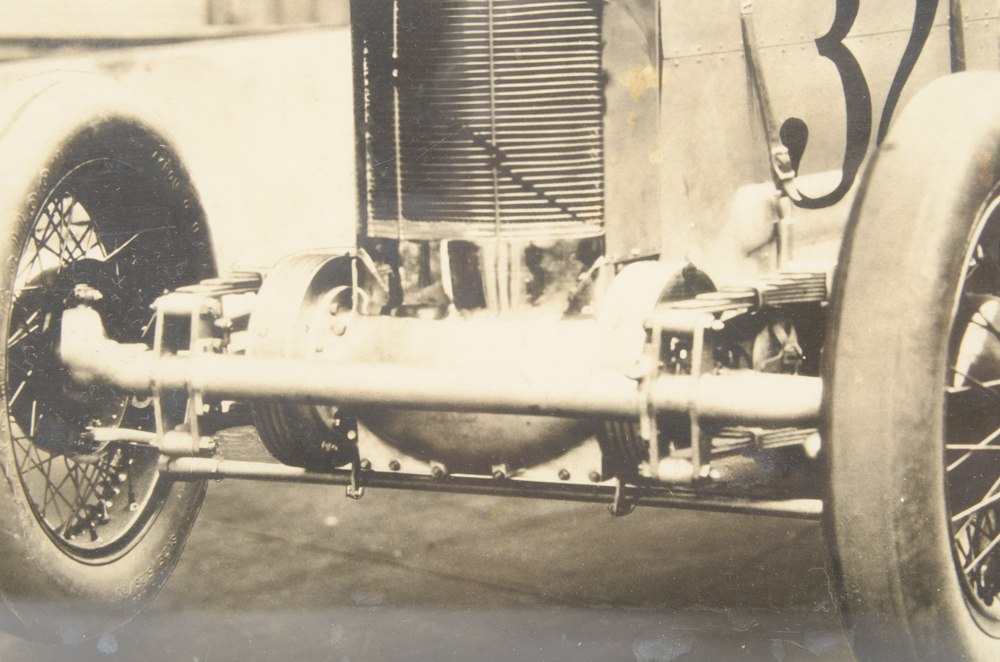 Six Black and White Race Car Photographs