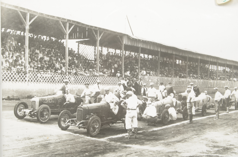 Six Black and White Race Car Photographs