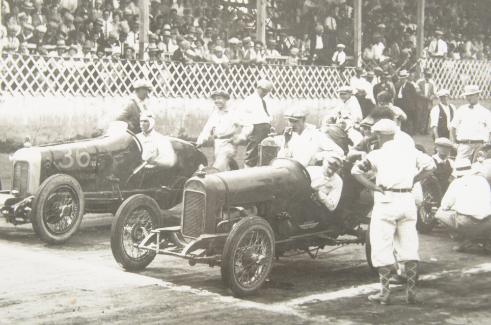Six Black and White Race Car Photographs