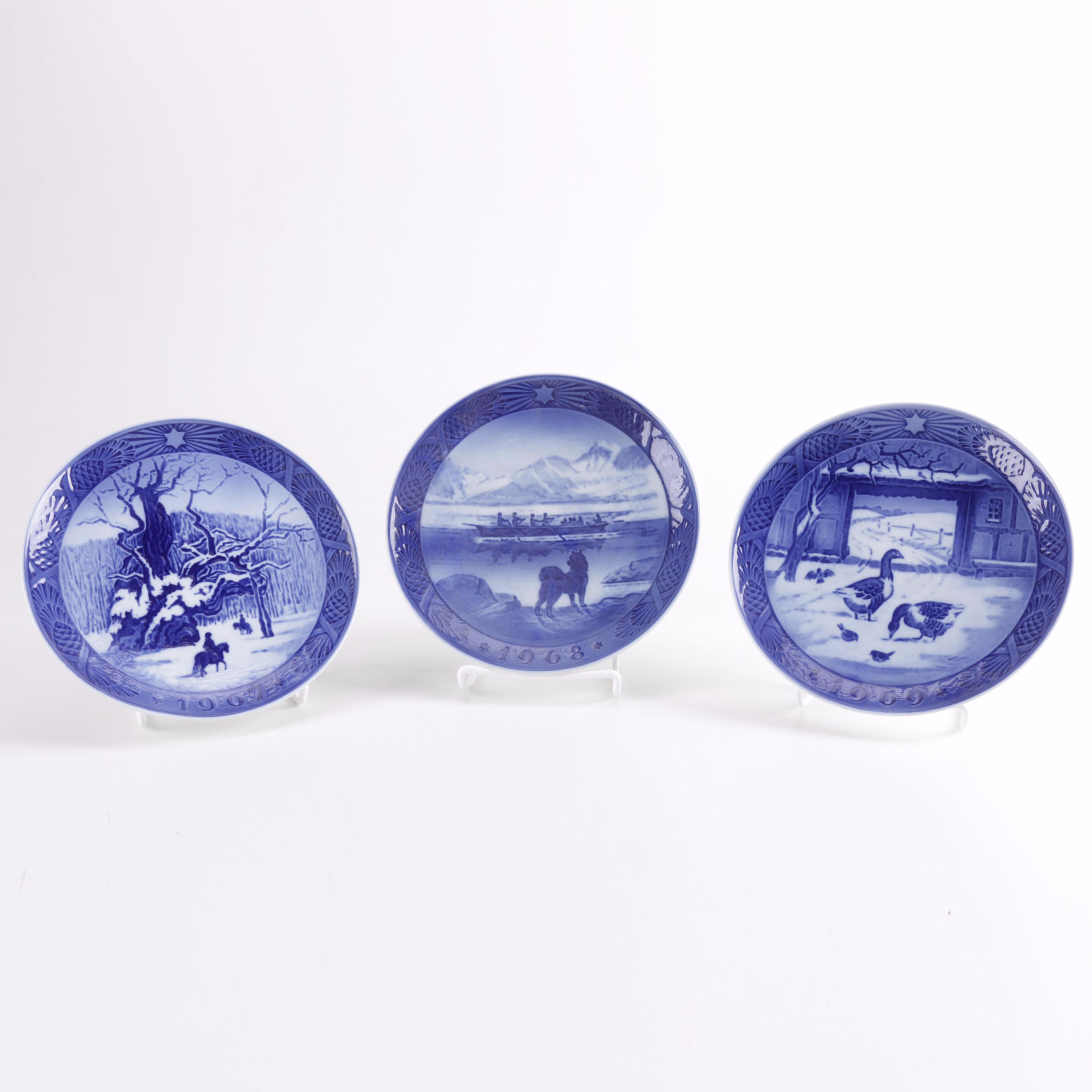 White and Blue Ceramic Decorative Plates From Royal Copenhagen