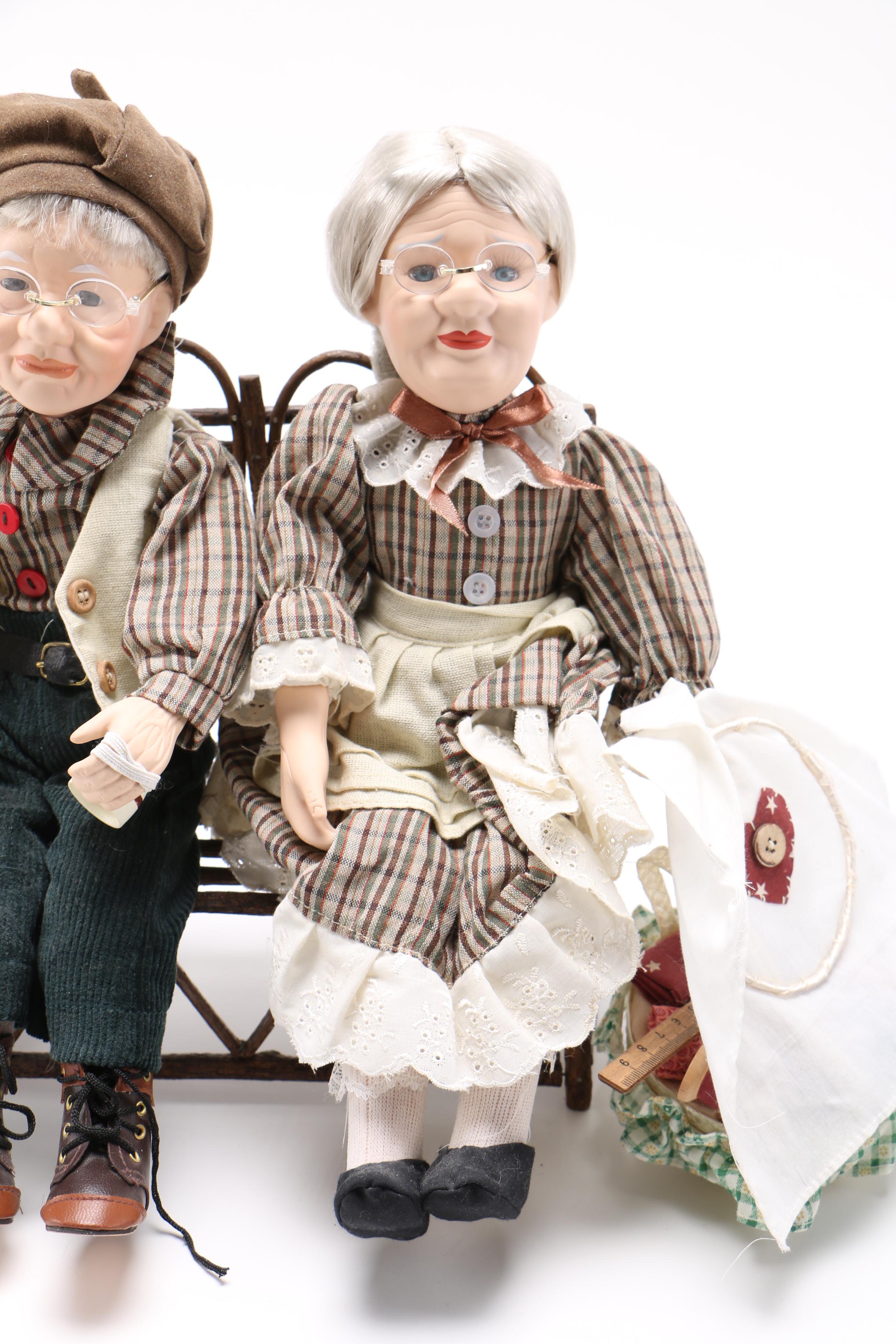 Dolls of Elderly Couple on a Heart Cane Bench