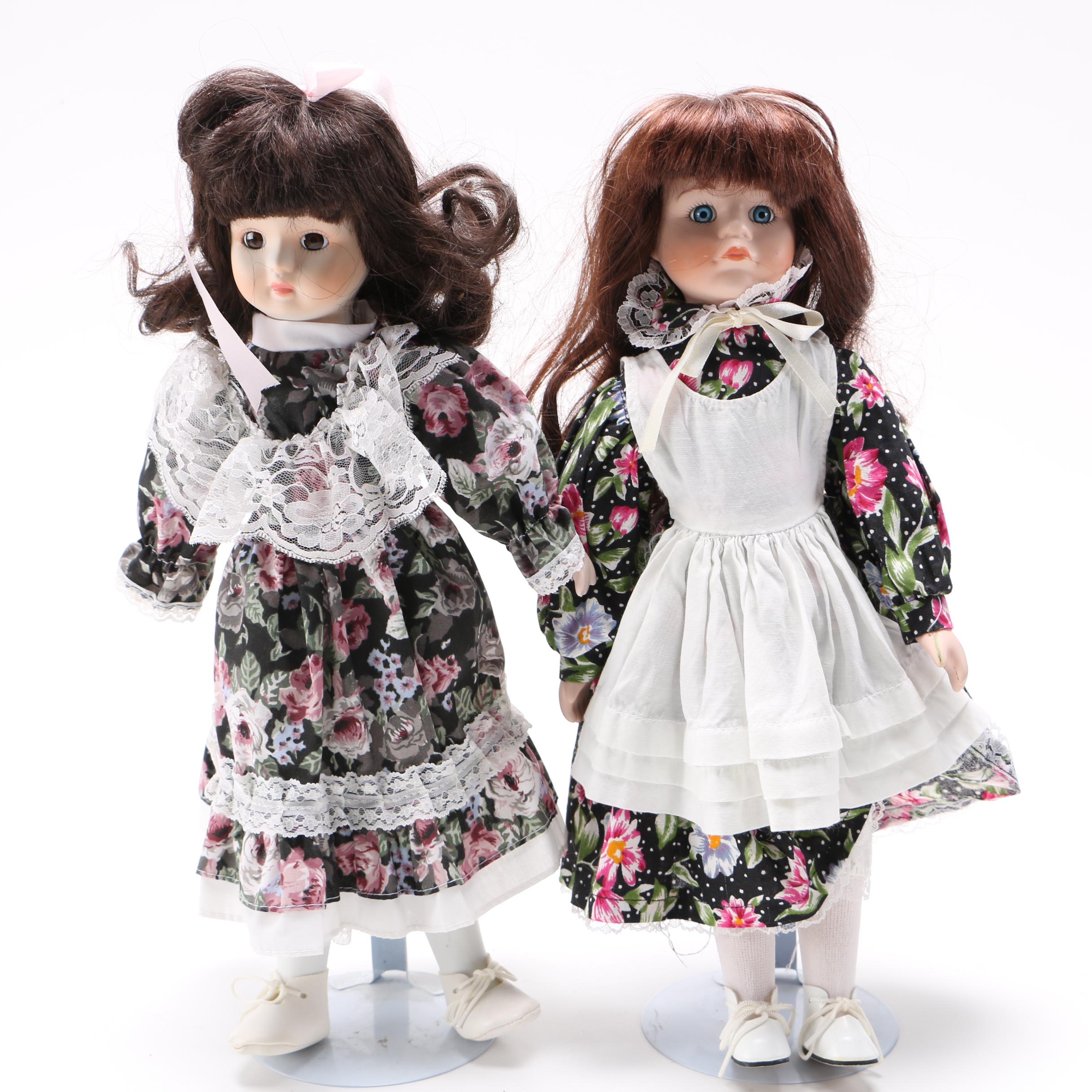 Four Porcelain Collector Dolls
