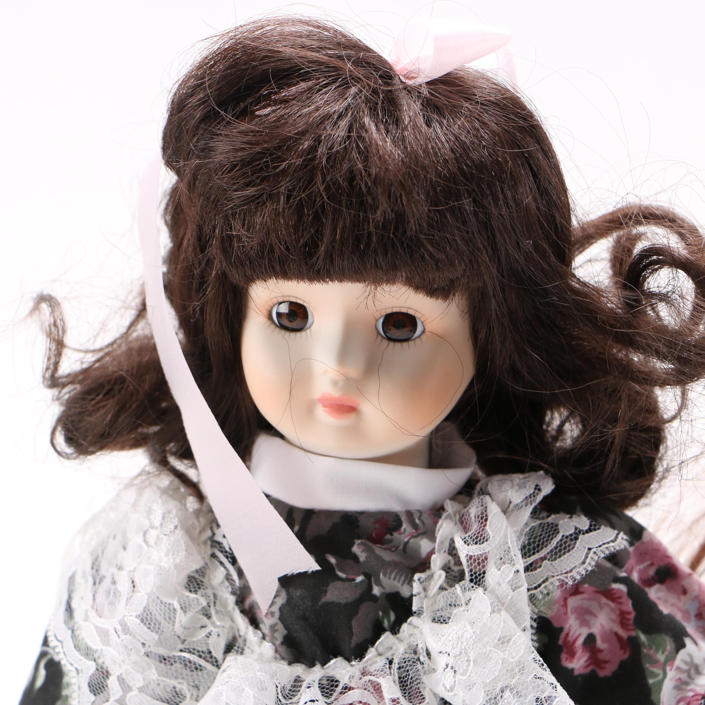 Four Porcelain Collector Dolls