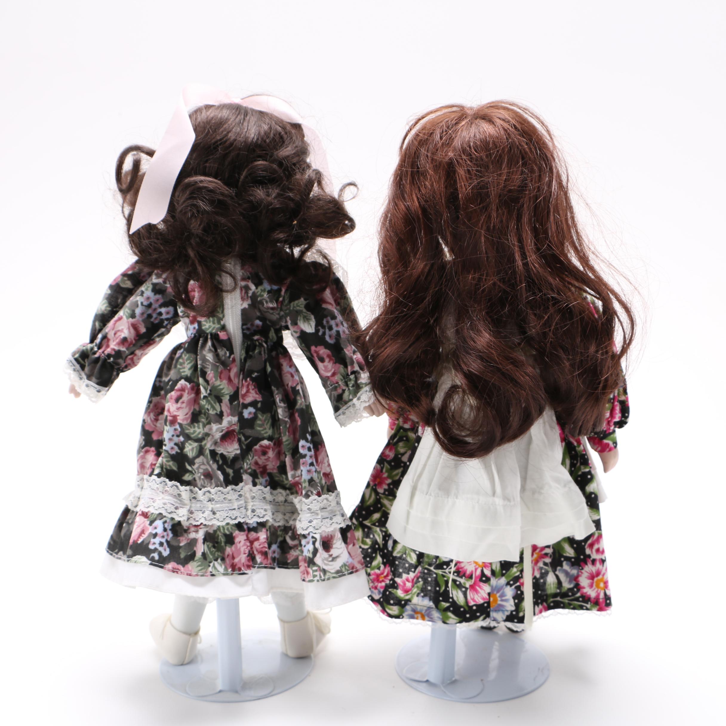 Four Porcelain Collector Dolls