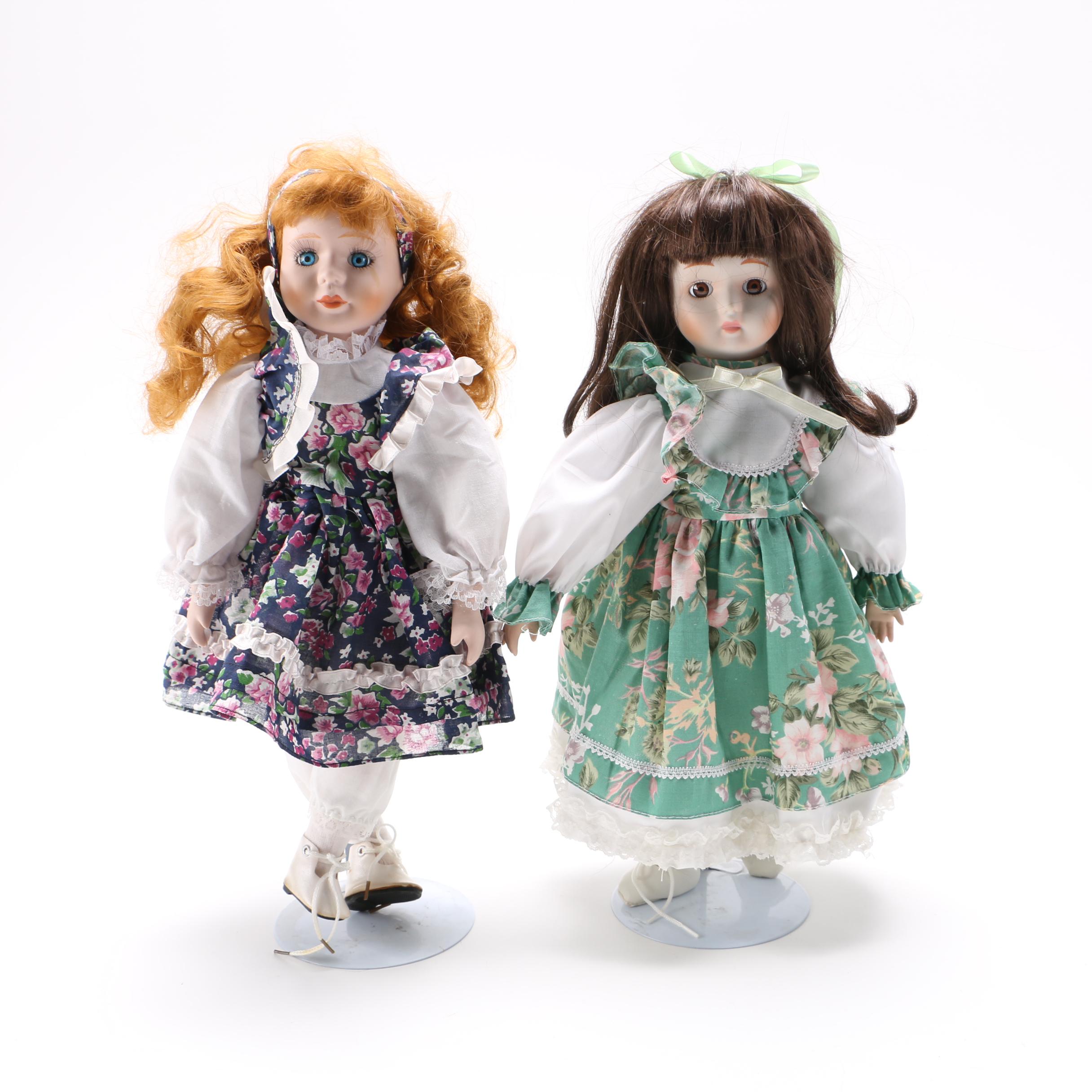 Four Porcelain Collector Dolls