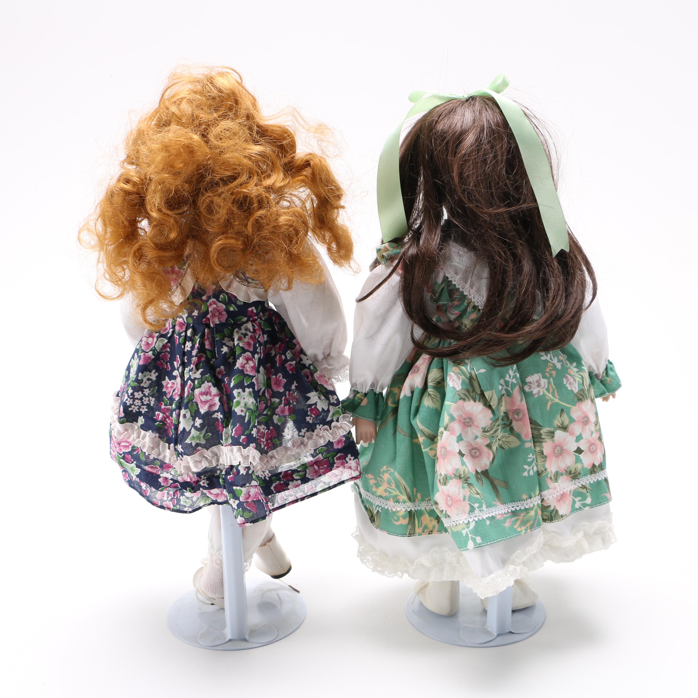 Four Porcelain Collector Dolls
