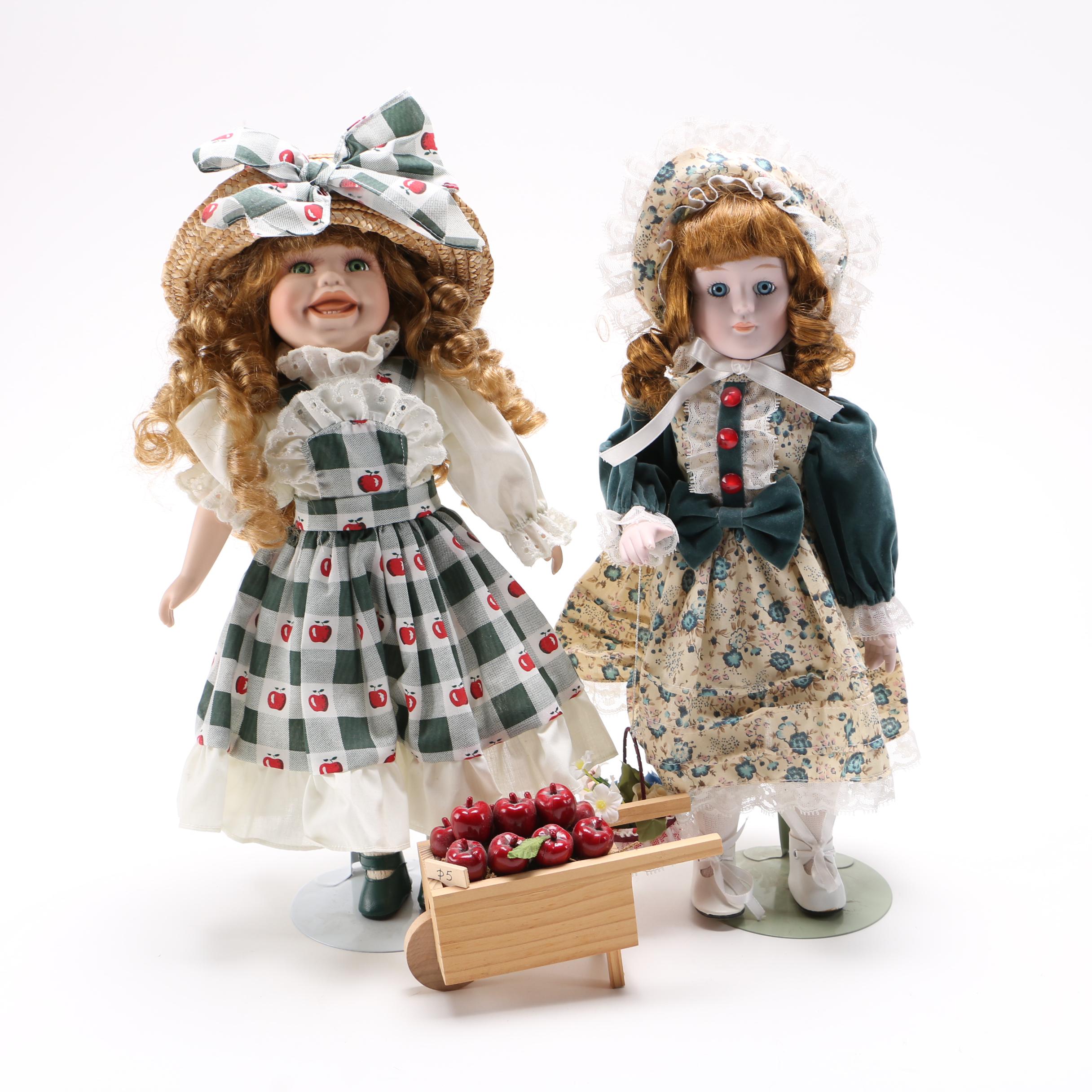 Two Porcelain Collector Dolls