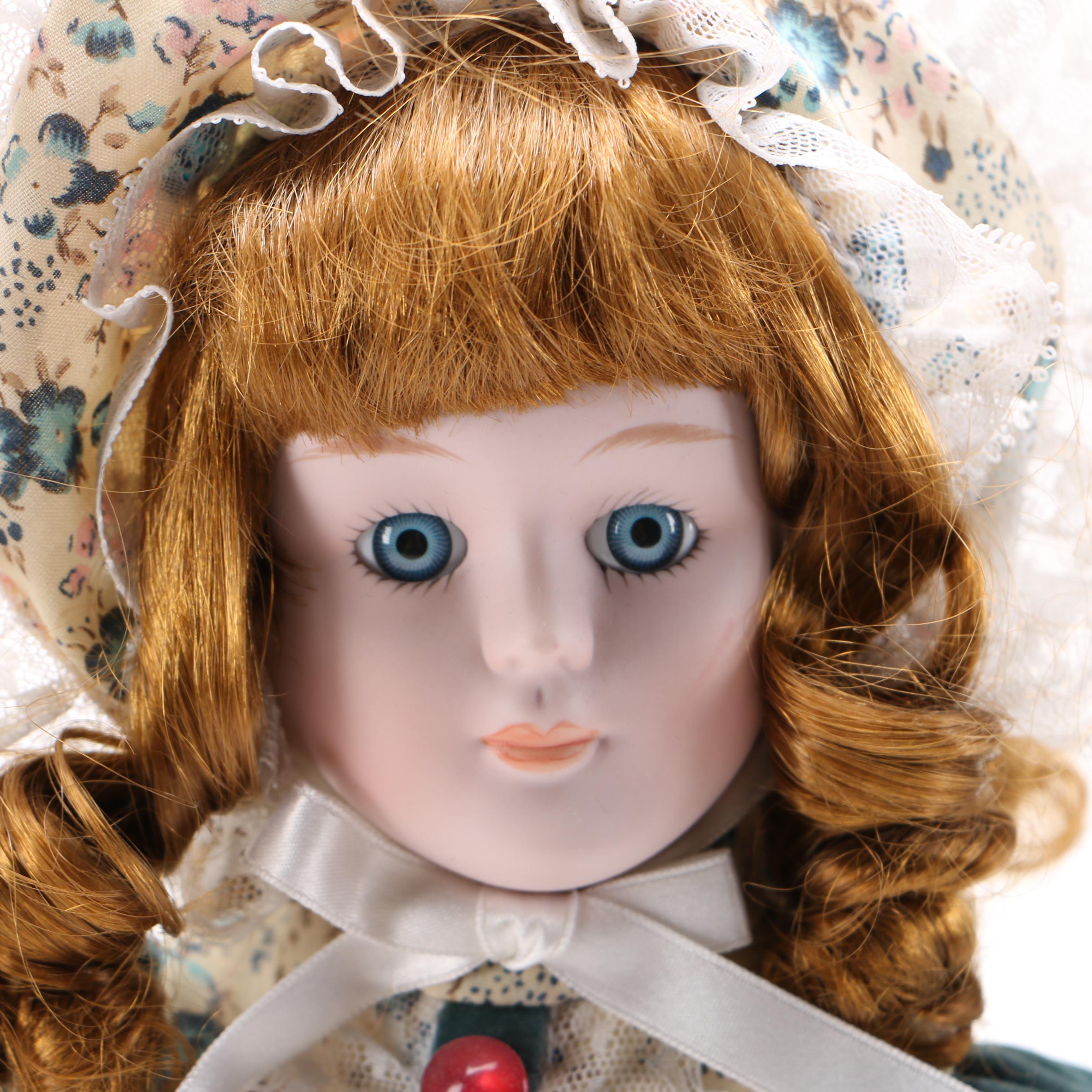 Two Porcelain Collector Dolls