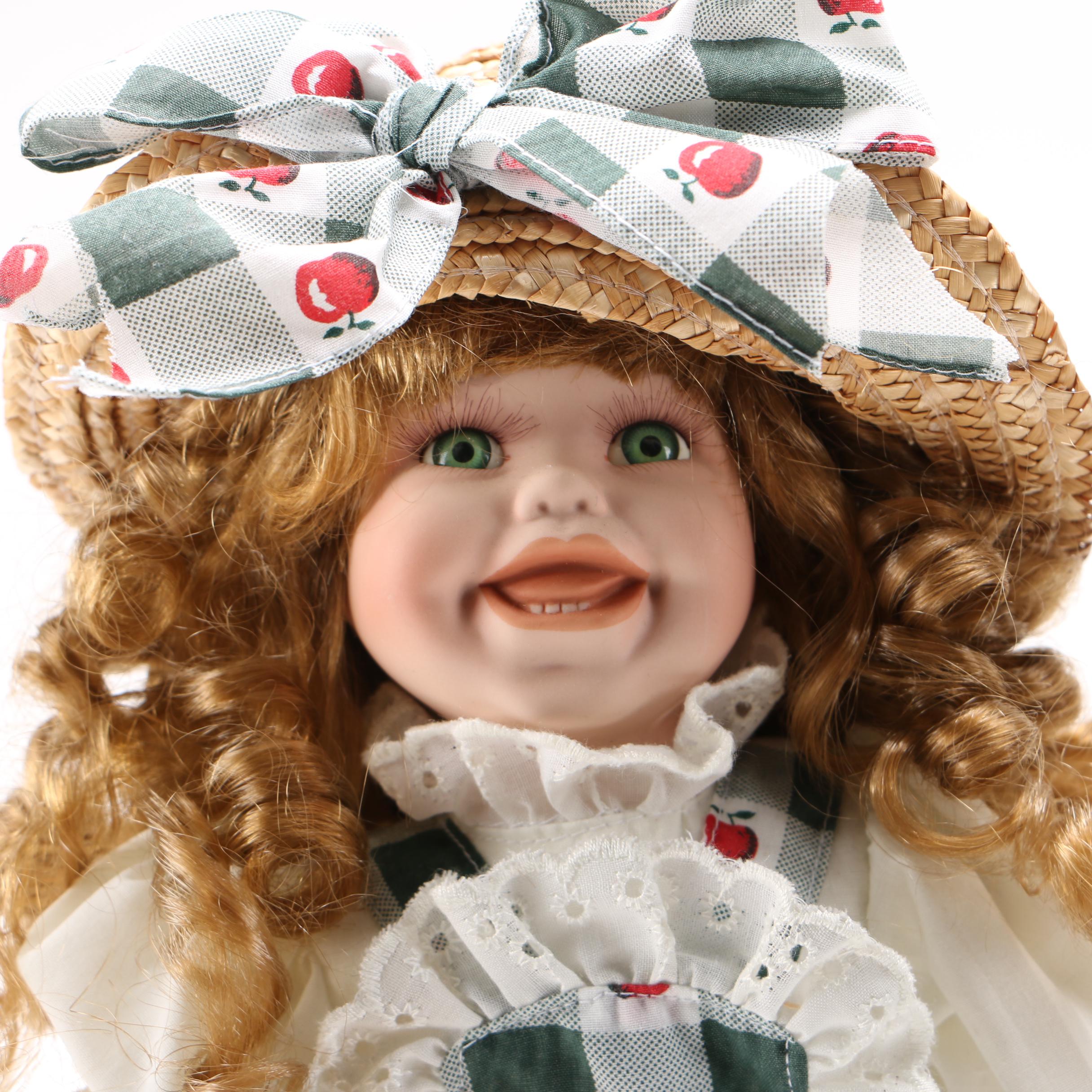 Two Porcelain Collector Dolls